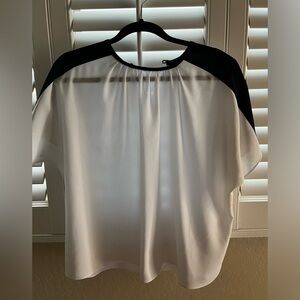 Black and white women’s blouse. Size medium